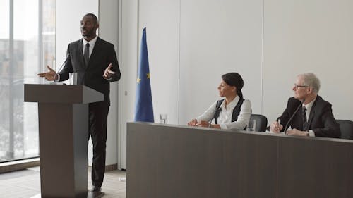 A Man in a Podium Giving a Speech