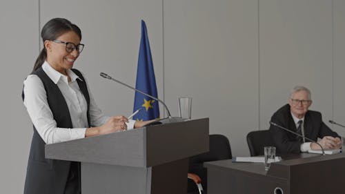 A Woman in a Podium Giving a Speech