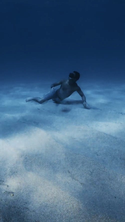 Man Swimming Underwater 