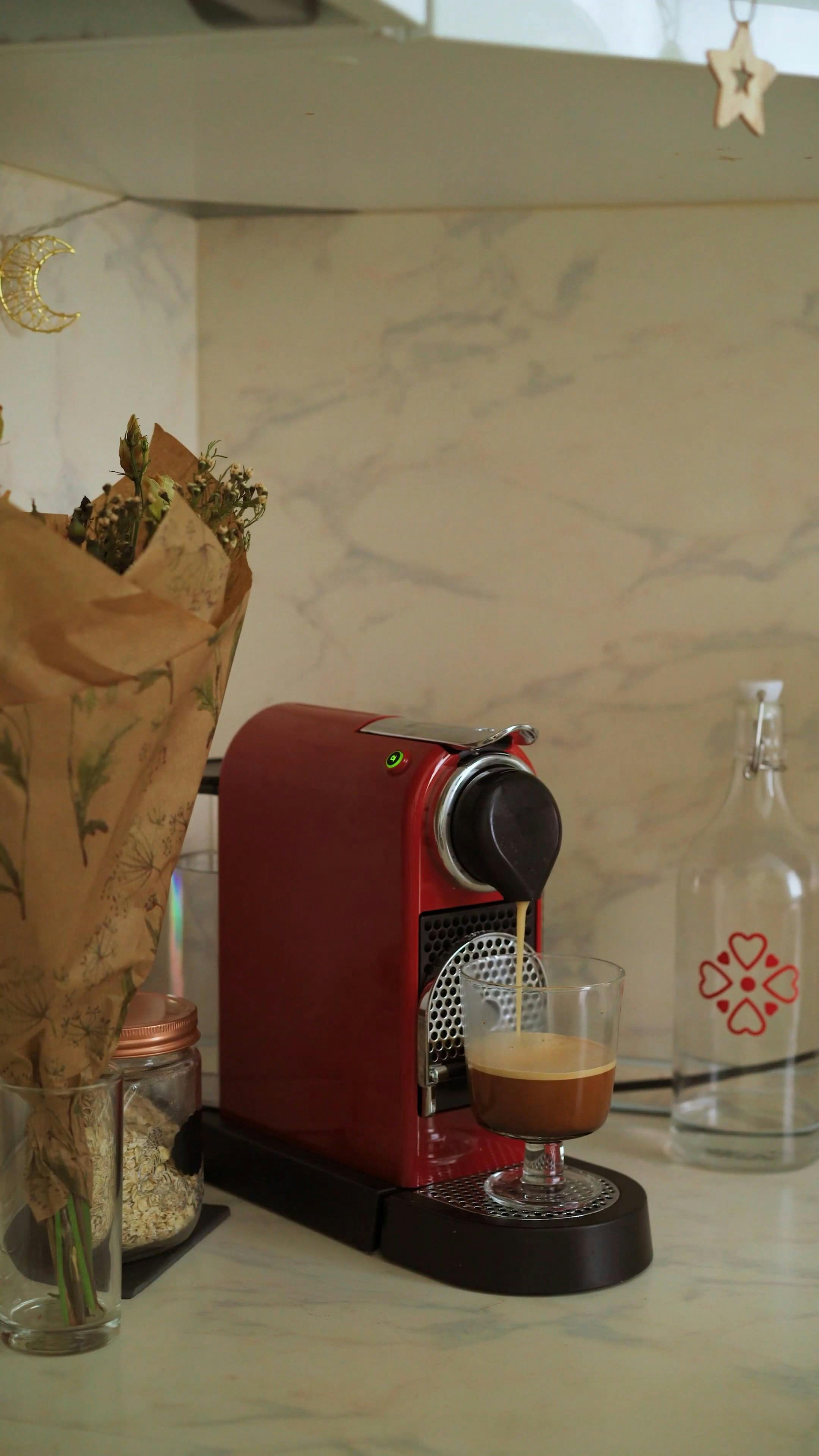 A Person Getting Coffee in a Cup on a Coffee Maker · Free Stock Video