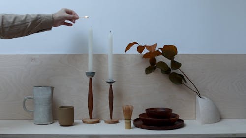 Person Lighting Candles