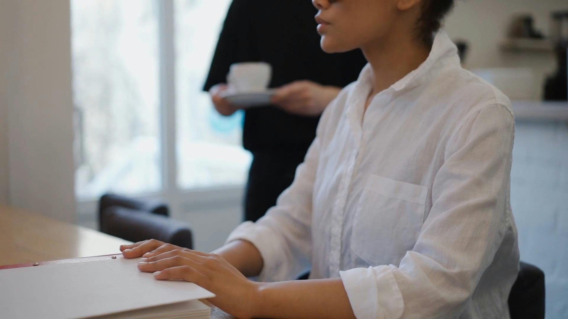 Blind Person Touching a Paper Cup · Free Stock Video