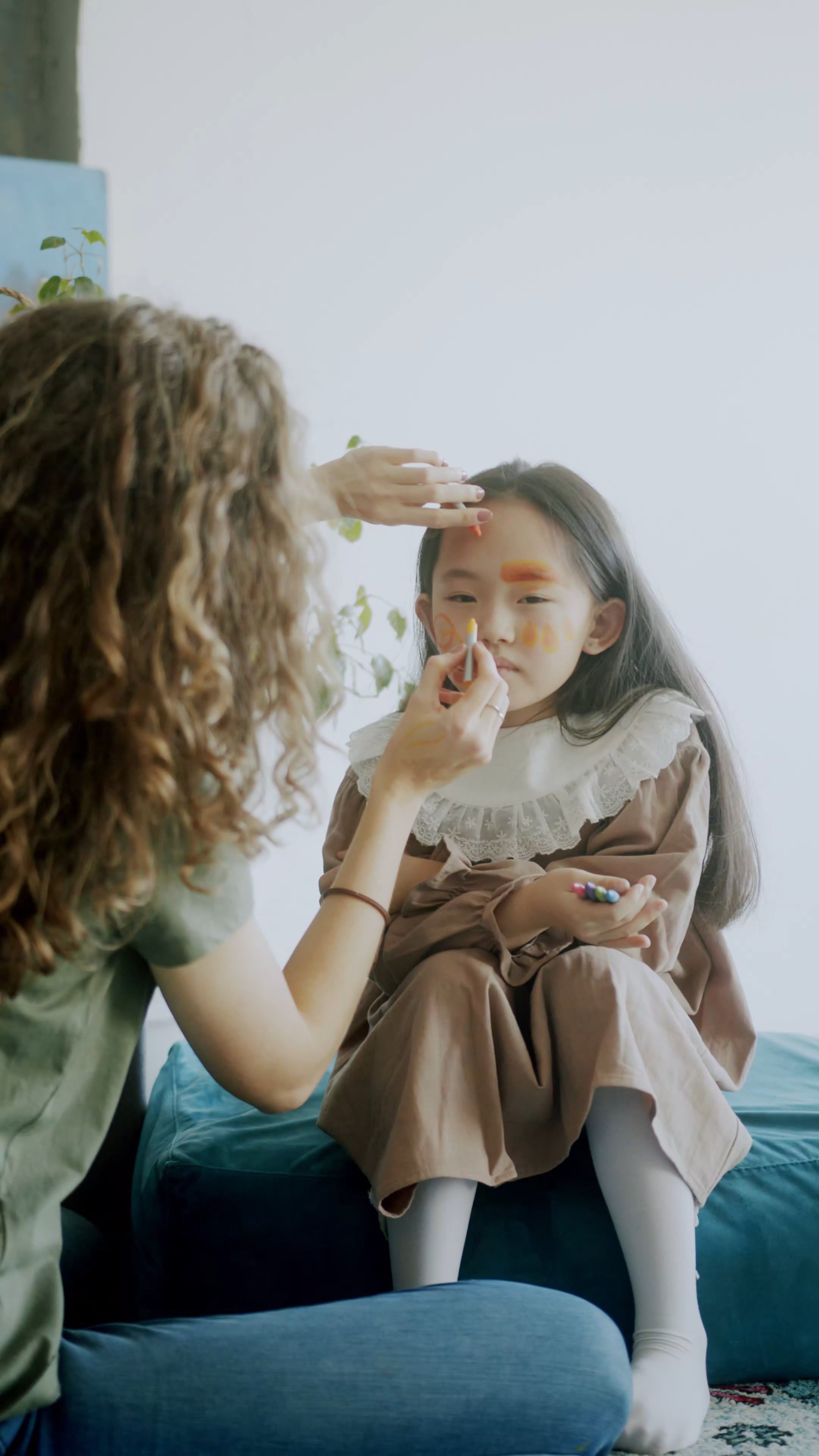 Woman Using Crayons to a Kids Face Free Stock Video Footage, Royalty ...