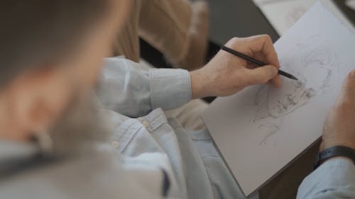 Video of a Person Sketching