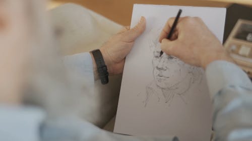 Man Drawing a Portrait