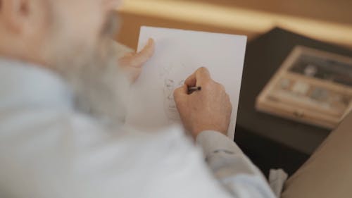 Video of a Person Sketching