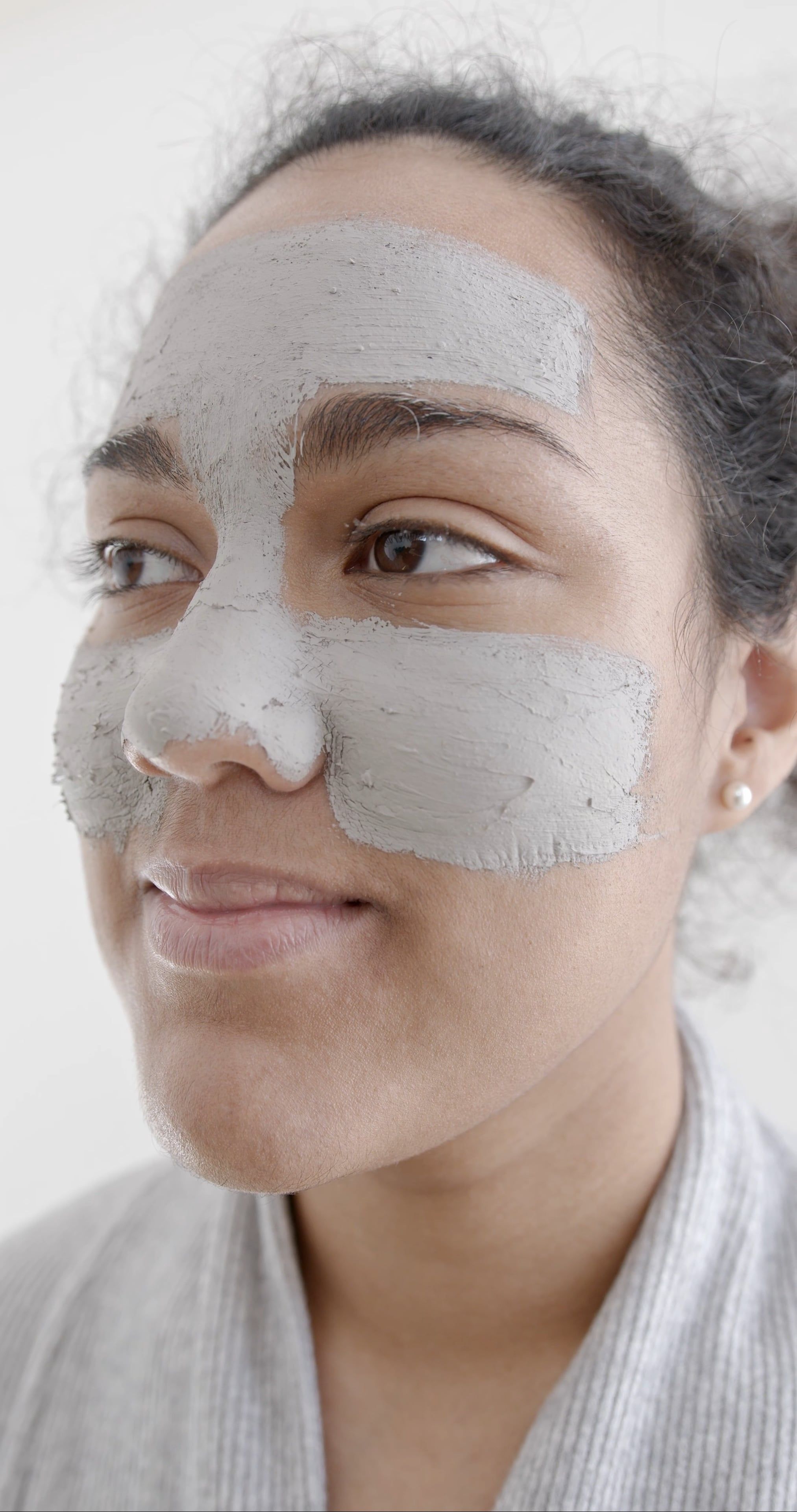 A Woman With a Facial treatment on Her Face · Free Stock Video