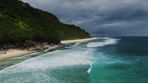 Waves Kissing The Beach Shore