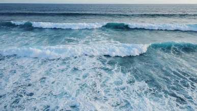 sea waves rippling towards the shore