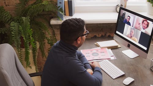 A Group Of Men In A Video Call Meeting