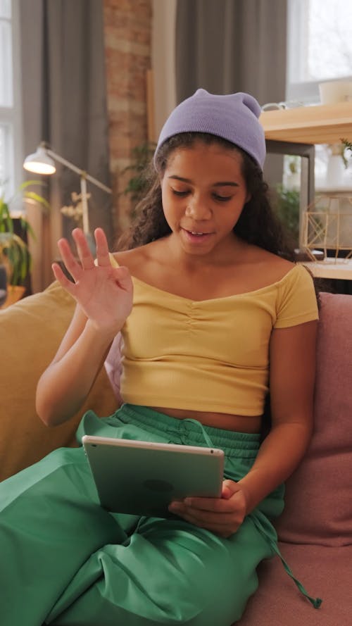 A Young Girl Communicating Via Video Call