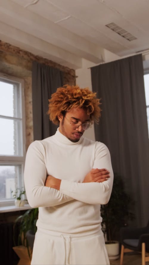 A Young Man In White Clothes