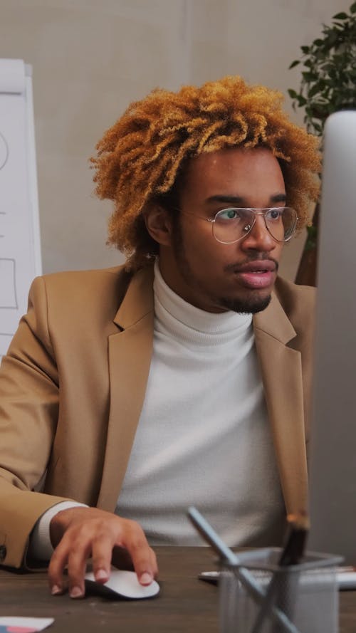 Adult Man Working on Computer