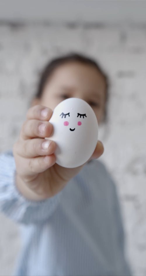 Child Showing an Painted Egg