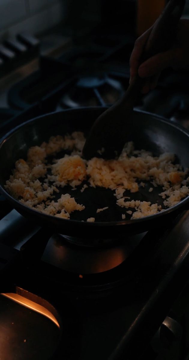 video of a person cooking friend rice 7008575