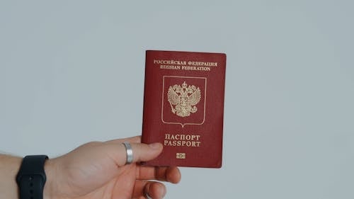 Close-Up Video of a Hand Holding a Passport
