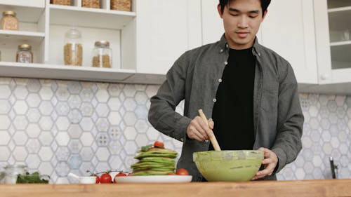 A Man Cooking Pancakes