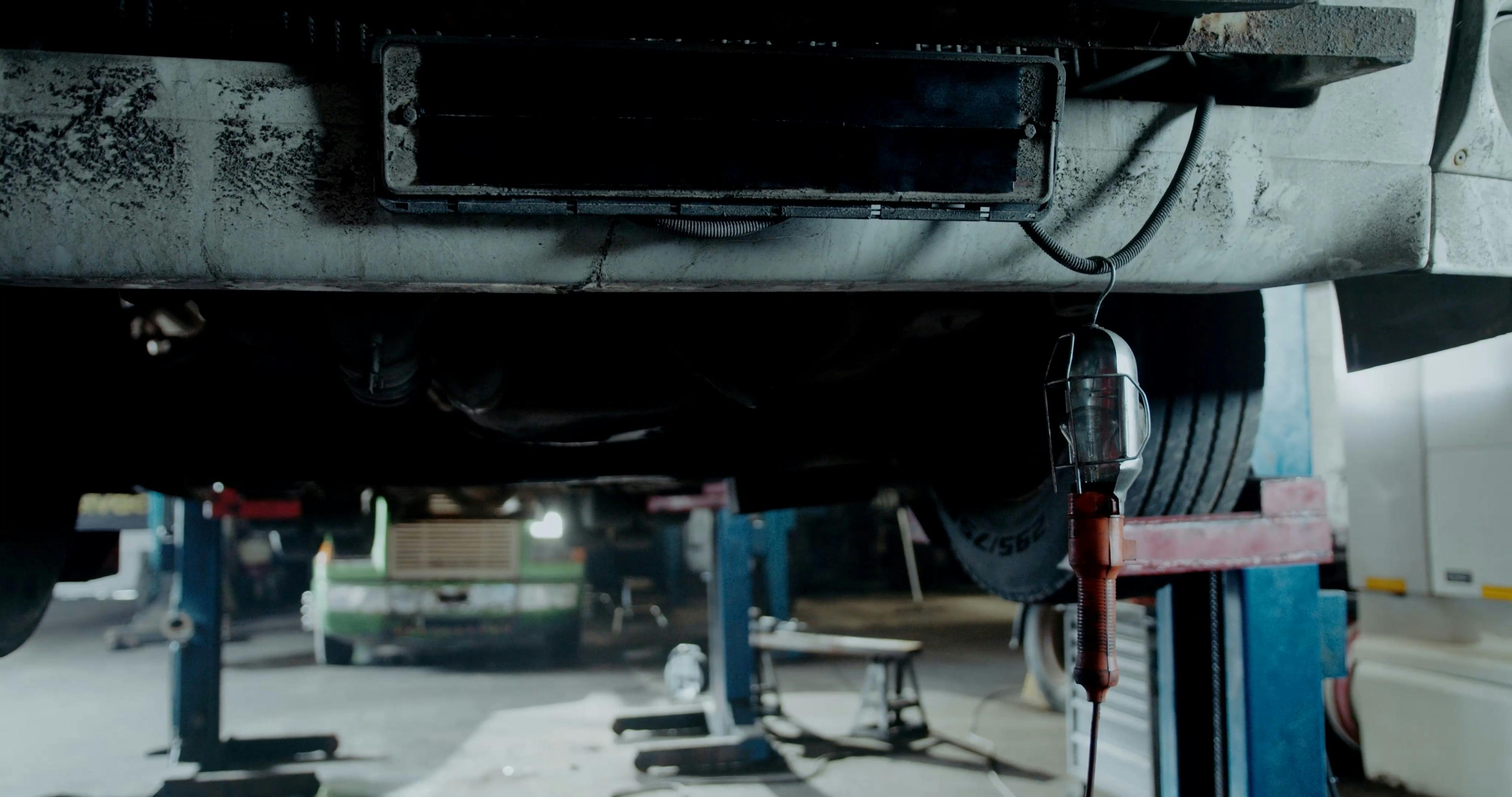 A Car Mechanic Checking the Under Chassis · Free Stock Video