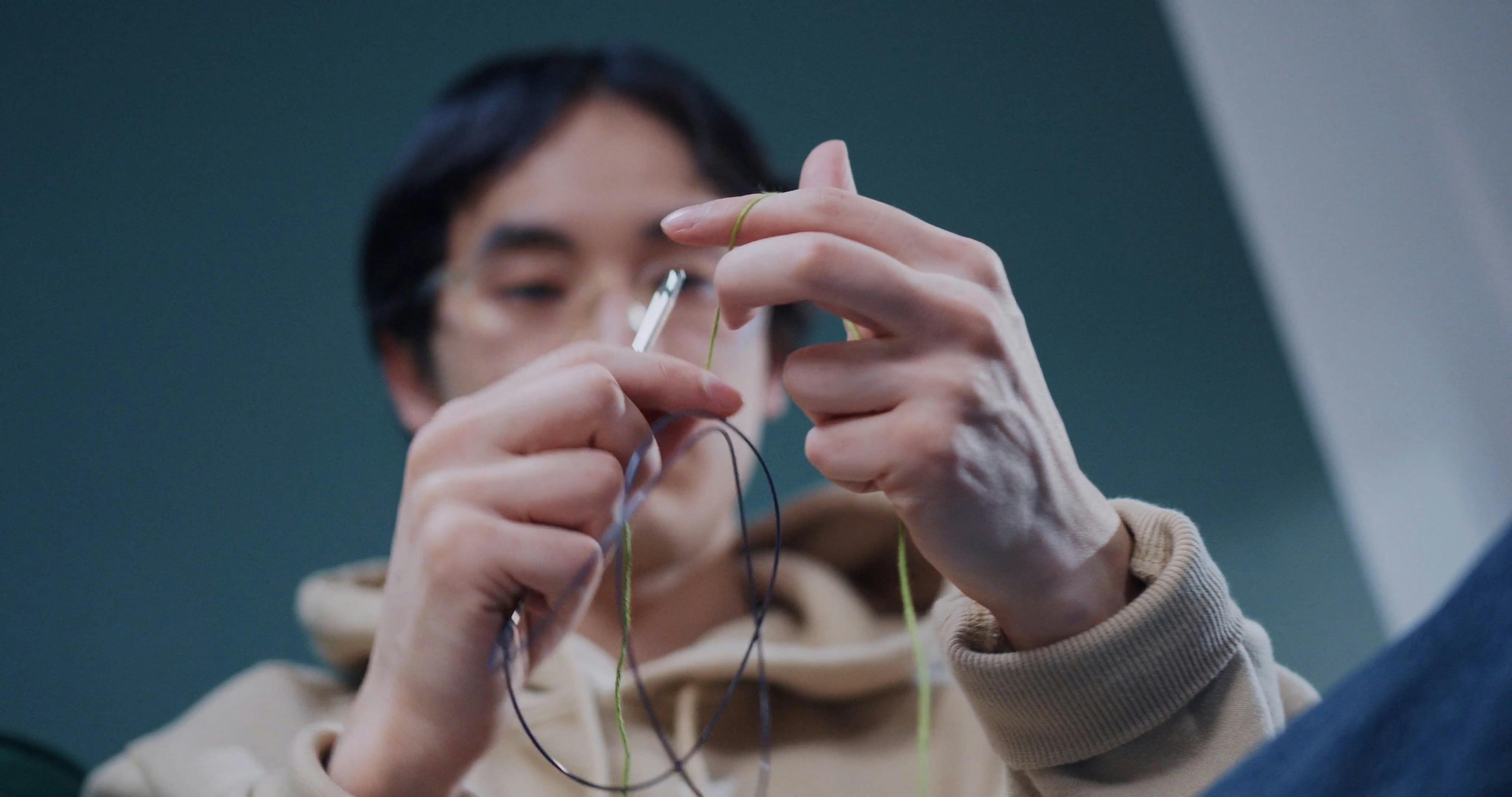 A Man Doing a Slipknot for Knitting · Free Stock Video