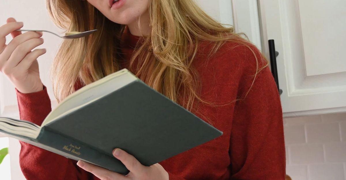 Reading Eating A Woman Eating while Reading a Book Free Stock Video Footage, Royalty ...