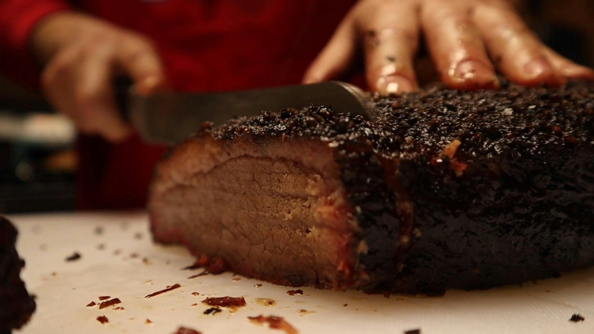 A Person Slicing a Brisket · Free Stock Video