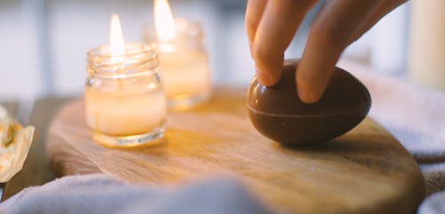 A Person Spinning a Chocolate Egg