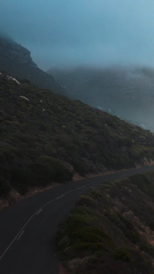 Footage of a Mountain Road by the Coast