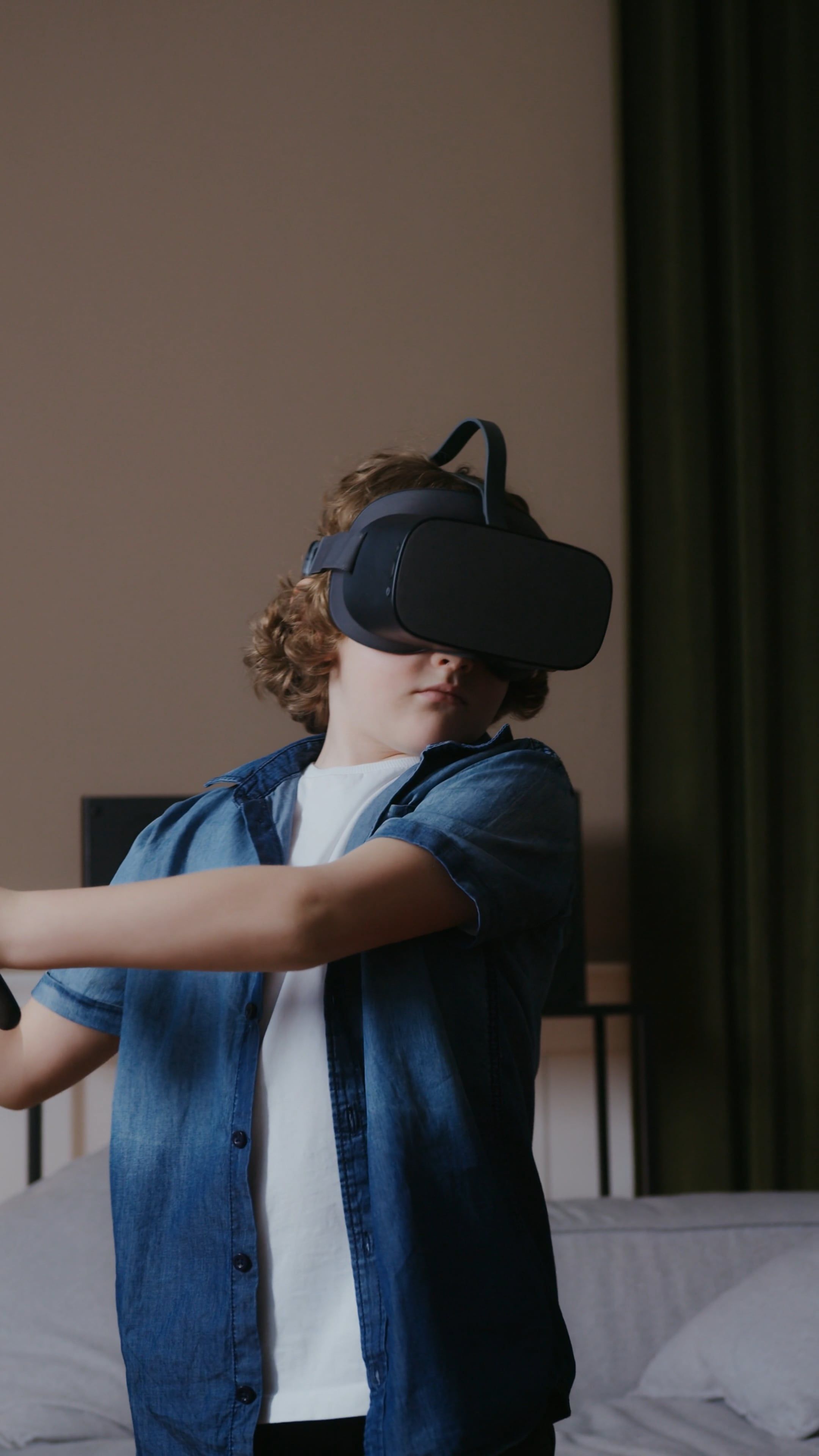 Video Of A Boy Using A VR Free Stock Video video-of-a-boy-using-a-vr-free-stock-video