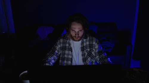 Video of a Man Playing on a Computer