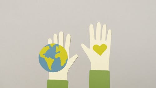 An Animation of Hands with a Globe and a Heart