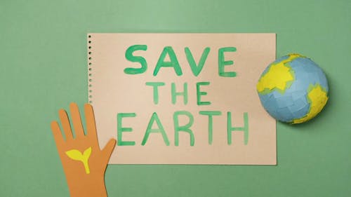 Save the Earth Written on a Paper