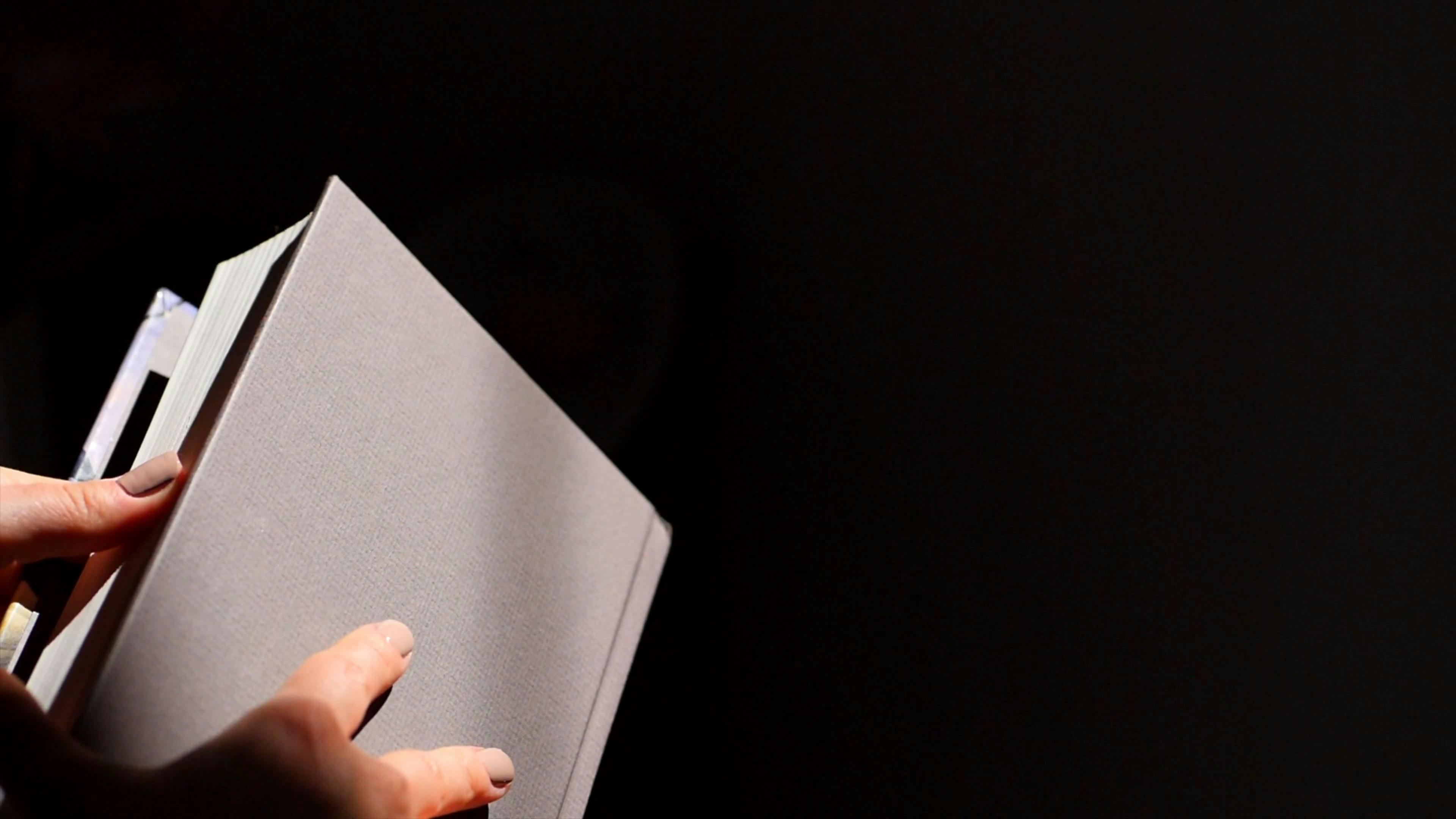 Person Flipping Book Pages · Free Stock Video