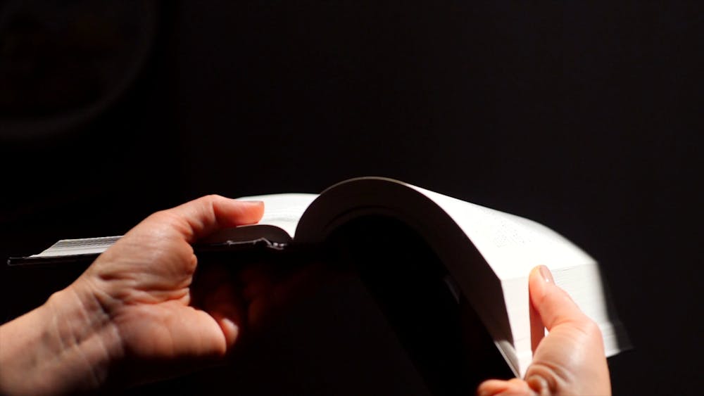 Flipping Pages of a Book · Free Stock Video
