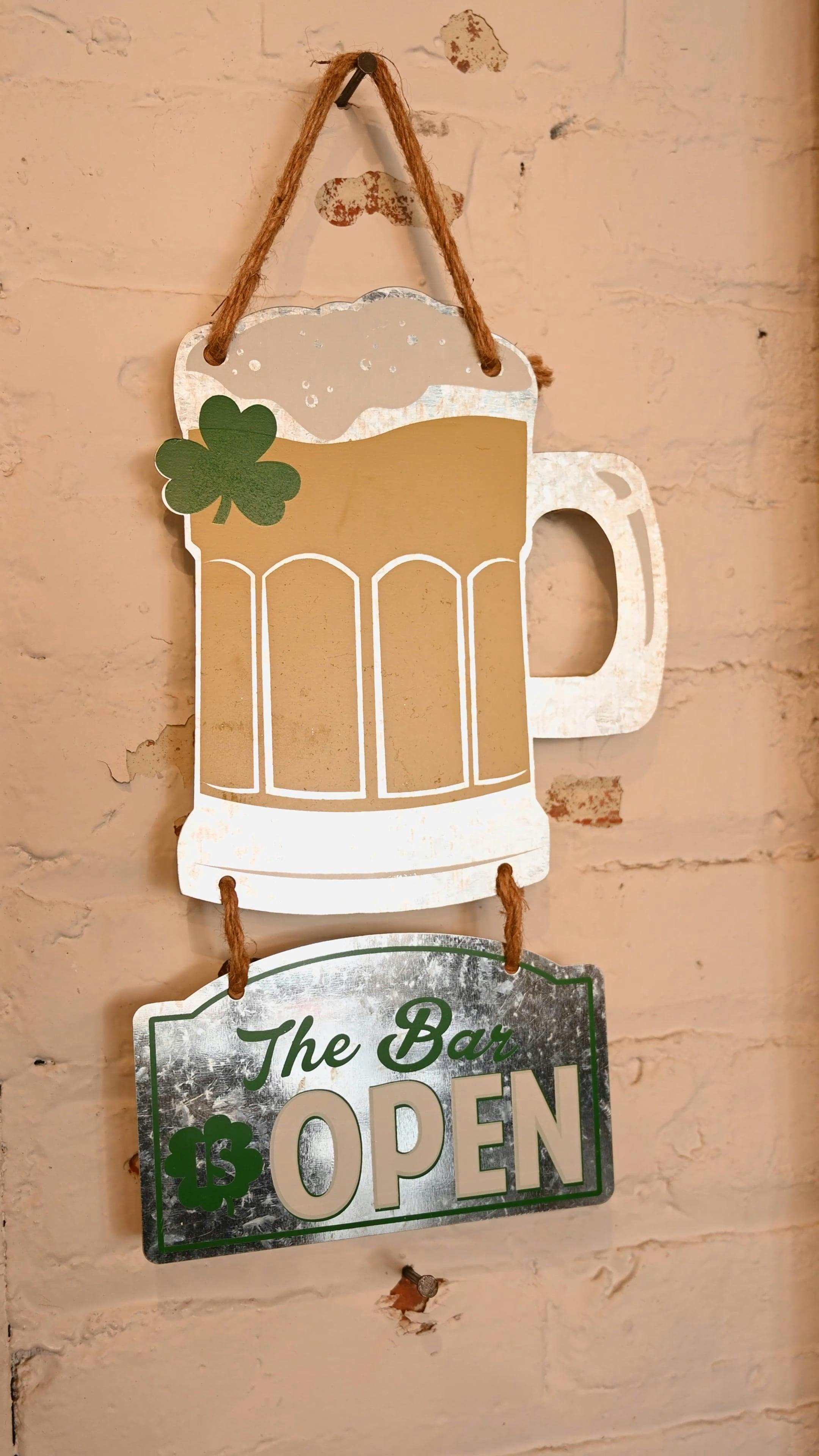 A Beer Signage Hanging on the Wall · Free Stock Video