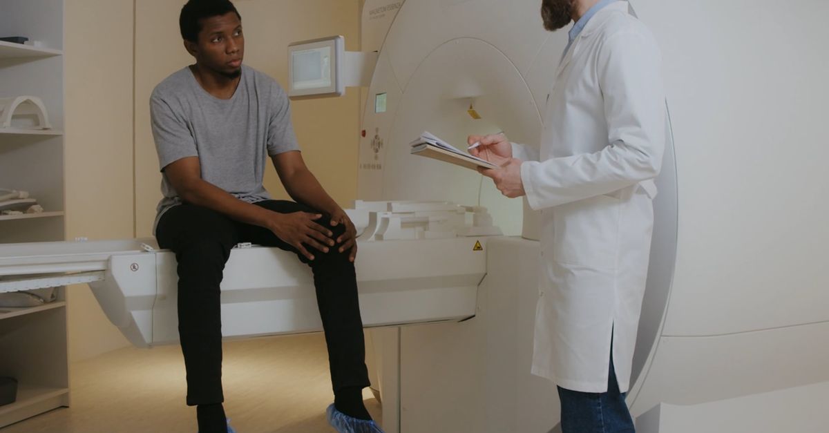 Testing Doctors Check A Doctor Checking On His Patient Before Testing Free Stock Video ...