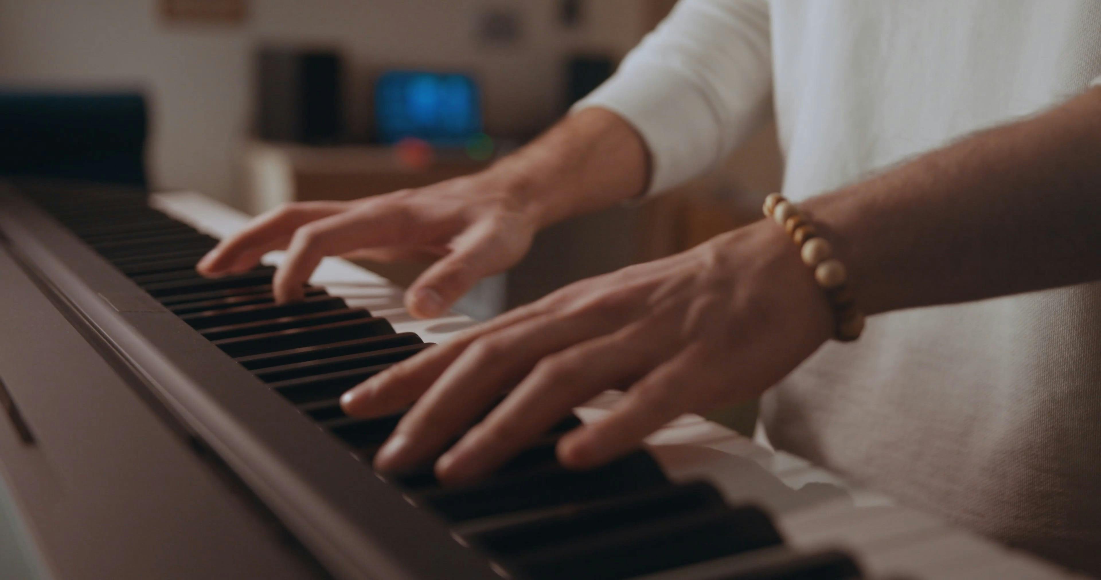 A Person Playing Synthesizer · Free Stock Video