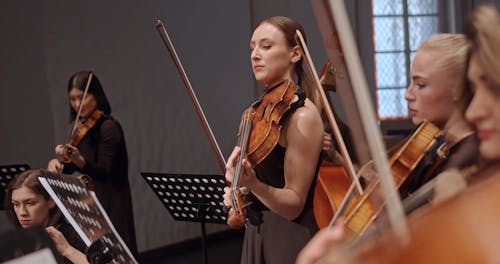 Women Playing Violin