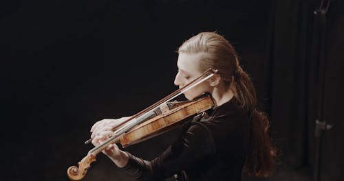 A Woman Playing Violin