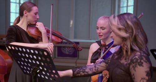 Women Playing Violin