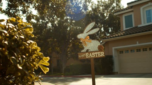 A Wooden Signage with Happy Easter Design