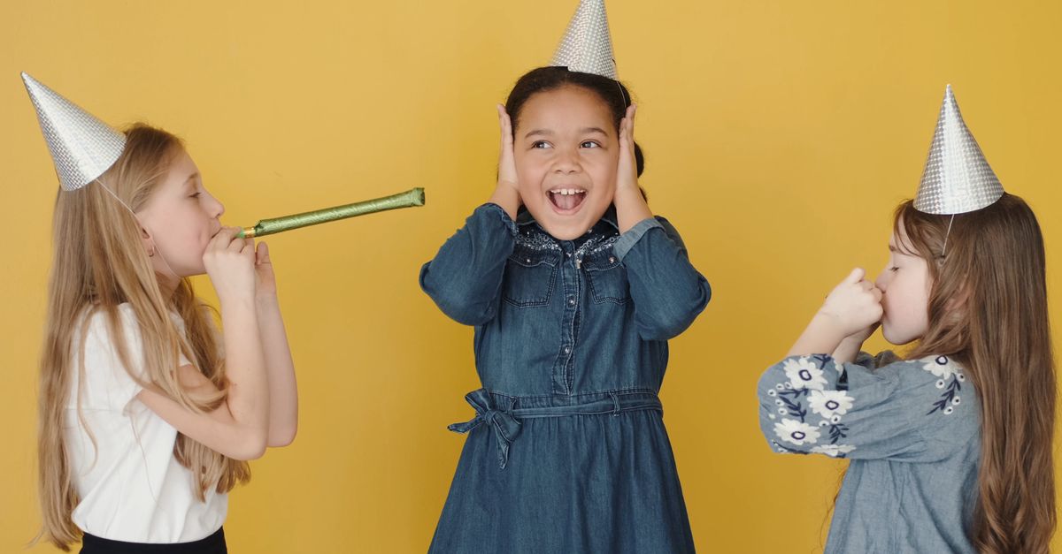 Girls Wearing Party Hats and Blowing the Party Blowers Free Stock Video ...