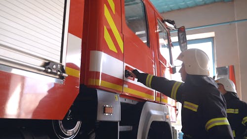 Firefighter Working on a Fire Truck · Free Stock Video