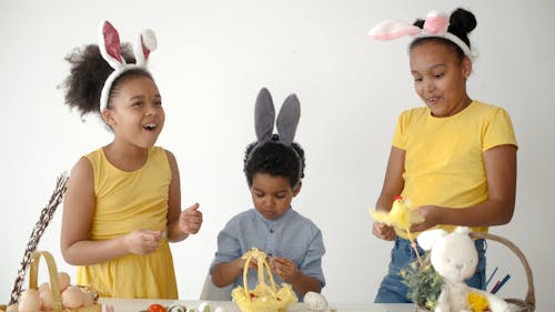 Children Eating Chocolate Eggs for Easter