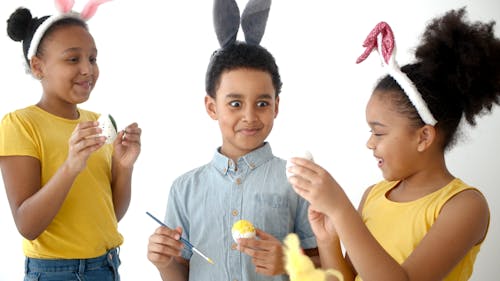 Kids Painting the Easter Eggs