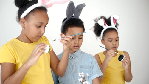 Video of Children Painting Easter Eggs