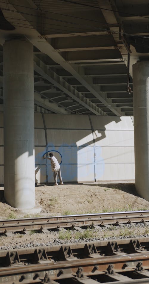 Graffiti Artist Making a Mural