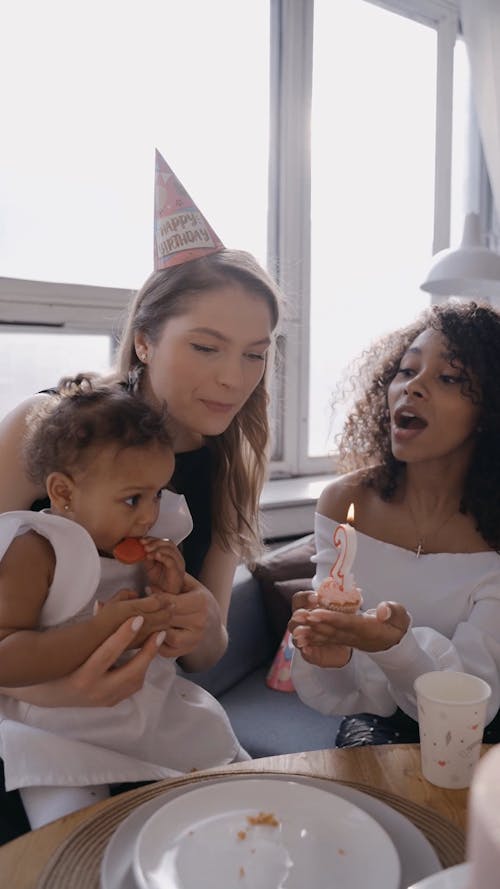 People Singing Happy Birthday for a Child