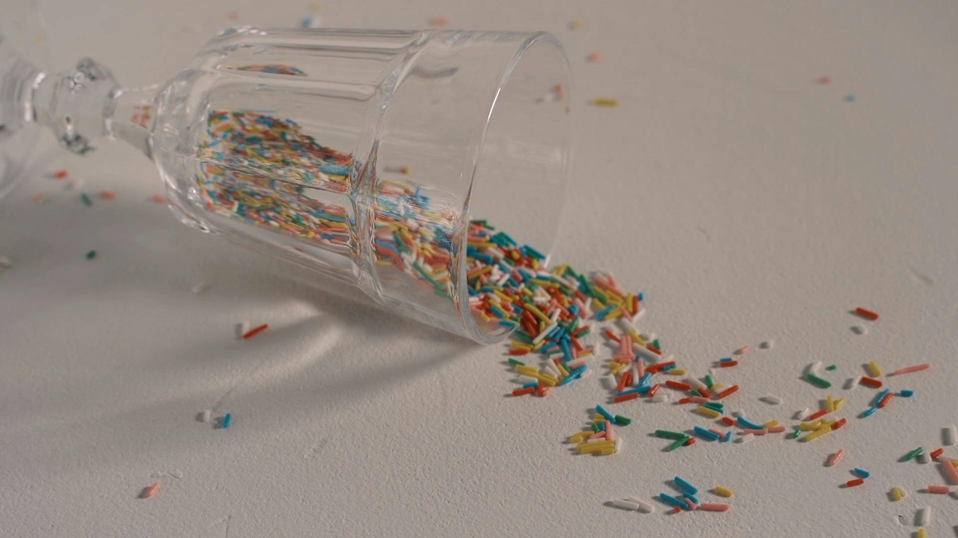 Spilled Sprinkles from a Drinking Glass Free Stock Video Footage ...