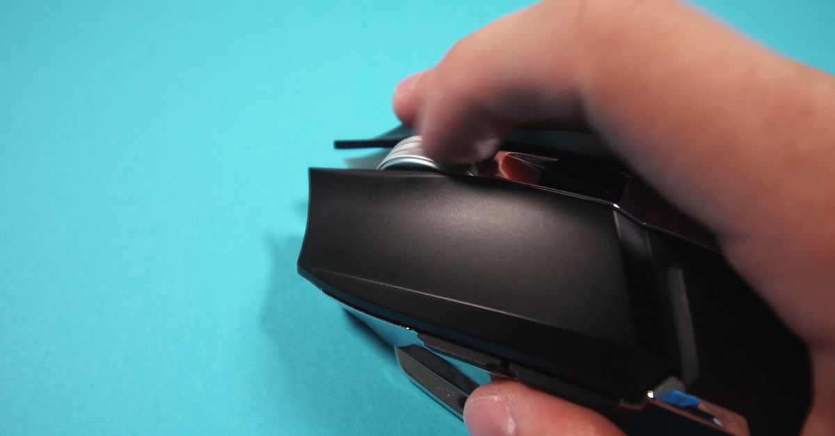 A Man Scrolling the Scroll Wheel of a Mouse Free Stock Video Footage ...