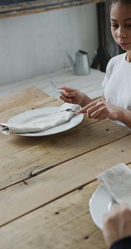 A Girl Studying Good Table Manners